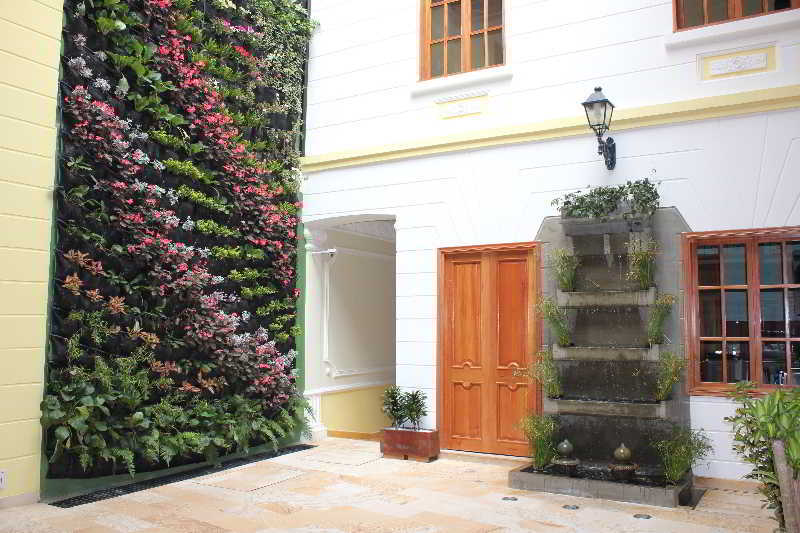 Hotel Santa Lucia Boutique Spa Bogotá Eksteriør bilde Vertical garden in a courtyard